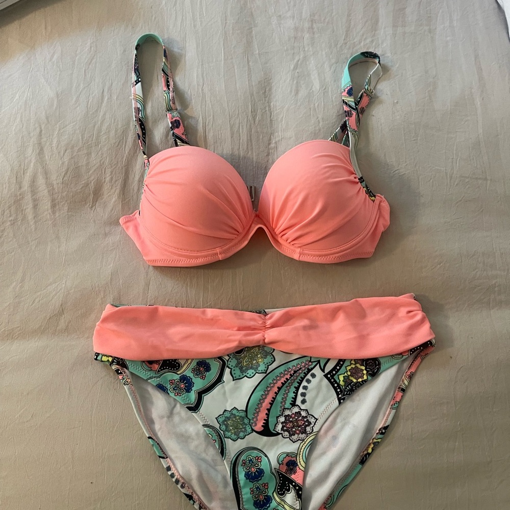 Size medium peach and multi color bikini.